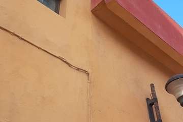  Preocupación en La Garita por la caída de cascotes de la fachada de la iglesia/TA.